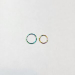 16 gauge rainbow anodized surgical steel infinity ring clickers.
